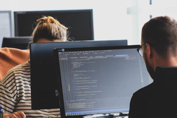 When is the right time to involve IT in a CBE program implementation?